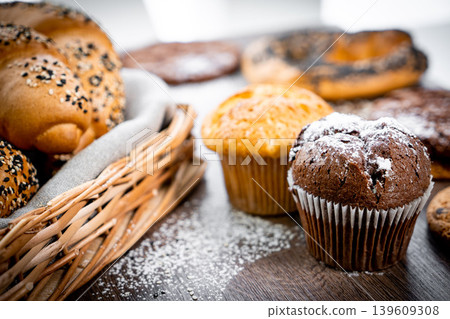 Fresh pastries buns wicker basket rustic style bakery Fresh pastries buns wicker basket rustic style bakery 139609308