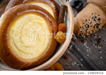 Fresh pastries buns wicker basket rustic style bakery Fresh pastries buns wicker basket rustic style bakery 139609316