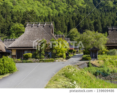 The scenery of Miyama thatched-roof village covered in fresh greenery. The scenery of Miyama thatched-roof village covered in fresh greenery. 139609486