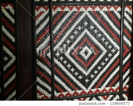 3D Cube Pattern on Traditional Javanese Bamboo Weaving Wall 3D Cube Pattern on Traditional Javanese Bamboo Weaving Wall 139609577