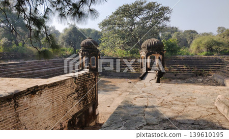 Tilla Jogian pakistan Mughal pond with jogi samadhis along the stone edge Tilla Jogian pakistan Mughal pond with jogi samadhis along the stone edge 139610195