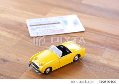 Image of a car and a driver's license Image of a car and a driver's license 139610400