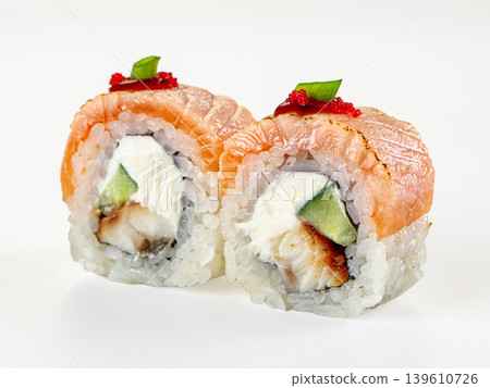 Seared salmon sushi rolls with cream cheese, eel, and cucumber on a white background 139610726