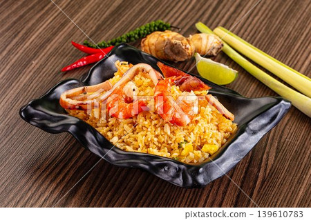 Asian fried rice with seafood 139610783