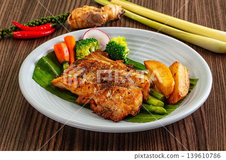 Gourmet asian Grilled crocodile steak Gourmet asian Grilled crocodile steak 139610786