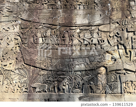 Reliefs of the Bayon Temple depicting the Champa army at the Battle of Tonle Sap Lake. Reliefs of the Bayon Temple depicting the Champa army at the Battle of Tonle Sap Lake. 139611529