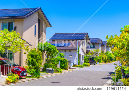 A quiet eco-town with underground power lines and solar power generation. 139611554