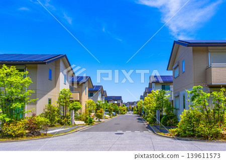 A quiet eco-town with underground power lines and solar power generation. 139611573