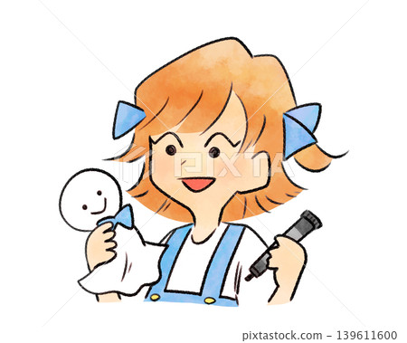 A girl making a teru teru bozu (weather doll). 139611600