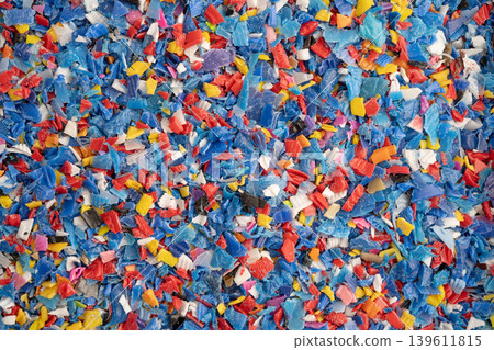 Plastic colorful pieces recycling shredded for industrial use. 139611815