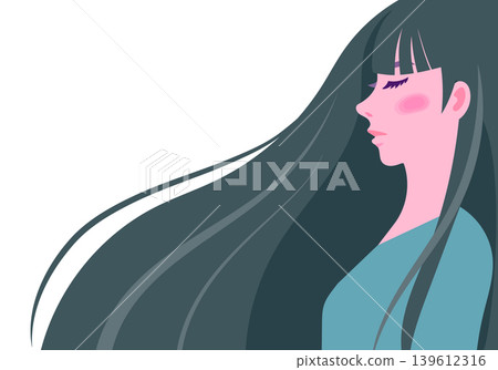 A close-up of a woman's profile with long hair blowing in the wind. 139612316