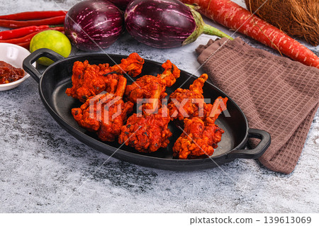 Indian cuisine - spicy Chicken lollipop Indian cuisine - spicy Chicken lollipop 139613069