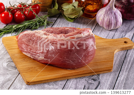 Raw pork sirloing over board Raw pork sirloing over board 139613277
