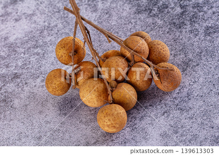 Sweet tropical exotic longan fruit heap 139613303