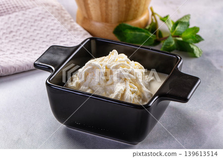 Italian soft young stracciatella cheese Italian soft young stracciatella cheese 139613514
