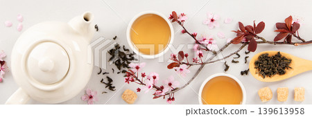 Tea Composition with Cherry Blossoms and Teapot Copy Space Tea Composition with Cherry Blossoms and Teapot Copy Space 139613958
