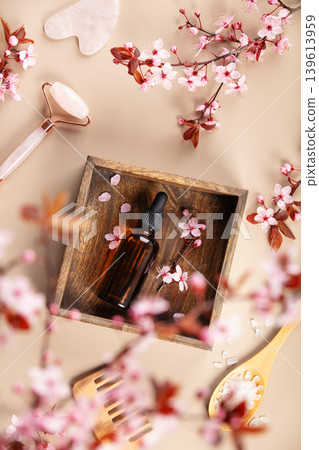 Natural Skincare Flat Lay with Essential Oil and Cherry Blossoms Natural Skincare Flat Lay with Essential Oil and Cherry Blossoms 139613959