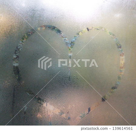 Autumn rain and a heart painted on misted glass. love symbol Autumn rain and a heart painted on misted glass. love symbol 139614561