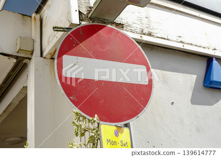 Assorted road signs being used in a UK town in 2026, some temporary some permanent. Including sign for diversions and walkways 139614777