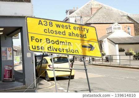 Assorted road signs being used in a UK town in 2026, some temporary some permanent. Including sign for diversions and walkways 139614810