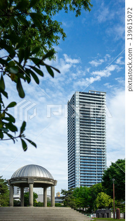 Fresh greenery and towering high-rise apartments in Sagami-Ono Central Park, Sagamihara City, Kanagawa Prefecture Fresh greenery and towering high-rise apartments in Sagami-Ono Central Park, Sagamihara City, Kanagawa Prefecture 139615072