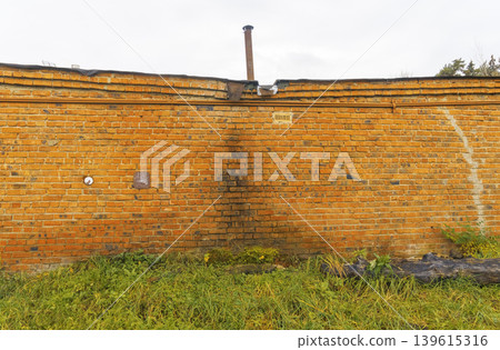 Charming and aged city boundary wall enhancing atmospheric and editorial photography themes Charming and aged city boundary wall enhancing atmospheric and editorial photography themes 139615316