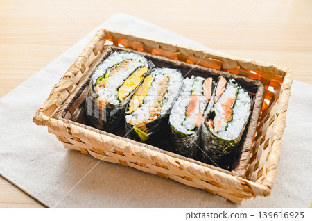 Two types of onigirazu in a basket Two types of onigirazu in a basket 139616925