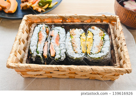Two types of onigirazu in a basket Two types of onigirazu in a basket 139616926