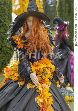 Halloween witch mannequin displaying autumn decoration in Prague 139617606