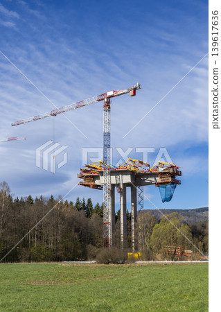 Construction crane building new highway bridge Construction crane building new highway bridge 139617636