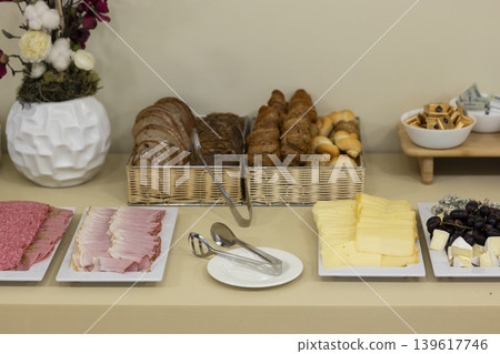 Hotel breakfast buffet offering fresh bread and cold cuts Hotel breakfast buffet offering fresh bread and cold cuts 139617746
