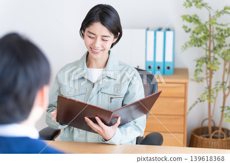 Businessmen in work clothes having a meeting Businessmen in work clothes having a meeting 139618368
