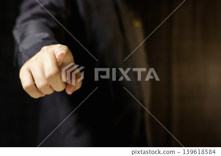 Man pointing finger at viewer. Hand Gesture. Business Concept. Attention and Selection Hand Gesture. High quality photo 139618584