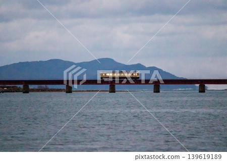 [Miyamai Line] Early morning local train crossing the Yuragawa Bridge 139619189