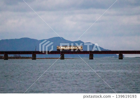 [Miyamai Line] Early morning local train crossing the Yuragawa Bridge 139619193