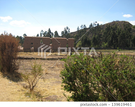The landscape of the Lakchi ruins, where the remains of Inca temples and nature are in harmony. The landscape of the Lakchi ruins, where the remains of Inca temples and nature are in harmony. 139619461