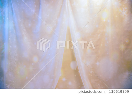 Person holding a violin case: against a sparkly light blue and orange background. Person holding a violin case: against a sparkly light blue and orange background. 139619599