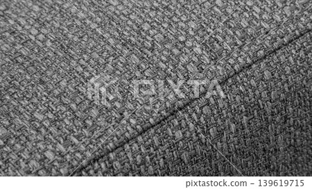 Textured Gray textile background with diagonal stitching Textured Gray textile background with diagonal stitching 139619715