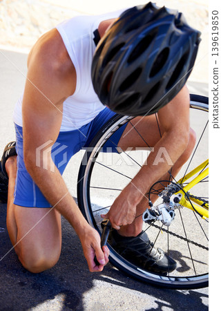 Man, bicycle and tyre repair on road problem for safety transport, performance or puncture. Male person, pump and gear improvement for speed or endurance for triathlon training, sport or practice Man, bicycle and tyre repair on road problem for safety transport, performance or puncture. Male person, pump and gear improvement for speed or endurance for triathlon training, sport or practice 139619850