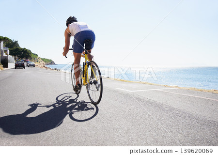 Cycling, back and sports person on bicycle travel, trip or journey for outdoor fitness, exercise or workout. Motion, mockup sky space and athlete ride sustainable bike for practice, hobby or training Cycling, back and sports person on bicycle travel, trip or journey for outdoor fitness, exercise or workout. Motion, mockup sky space and athlete ride sustainable bike for practice, hobby or training 139620069