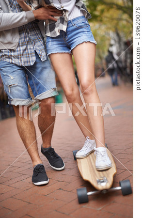 Skateboard ride, legs and learning couple of friends teaching partner sports skills, exercise lesson or practice movement. Skate shoes, date and outdoor people helping, coaching and support balance Skateboard ride, legs and learning couple of friends teaching partner sports skills, exercise lesson or practice movement. Skate shoes, date and outdoor people helping, coaching and support balance 139620078