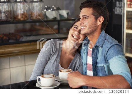Love, happy couple and drinking coffee in shop, cafe and bonding together on valentines day date. Smile, man and woman in restaurant with latte for connection, commitment and support in relationship Love, happy couple and drinking coffee in shop, cafe and bonding together on valentines day date. Smile, man and woman in restaurant with latte for connection, commitment and support in relationship 139620124