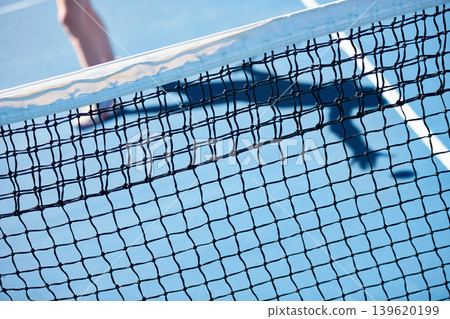 Tennis court, outdoor or closeup of net with space for mockup, workout or playing in practice. Sports, equipment or athlete in training, arena or fitness exercise at game, contest or competition Tennis court, outdoor or closeup of net with space for mockup, workout or playing in practice. Sports, equipment or athlete in training, arena or fitness exercise at game, contest or competition 139620199