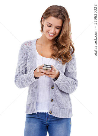 Woman, smile and smartphone for social media in studio, mobile app and scrolling on website. Happy female person, communication and typing on technology, online conversation and white background Woman, smile and smartphone for social media in studio, mobile app and scrolling on website. Happy female person, communication and typing on technology, online conversation and white background 139620328