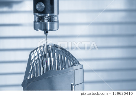 Quality control of a headlight reflection mold on a CNC milling machine using a high-precision touching probe. 139620410