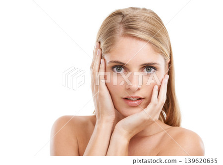 Woman, portrait and confidence in studio with beauty, hands and pride for cosmetic treatment or glow. Model, person or face with smile for haircare and skin with mock up space on white background Woman, portrait and confidence in studio with beauty, hands and pride for cosmetic treatment or glow. Model, person or face with smile for haircare and skin with mock up space on white background 139620635