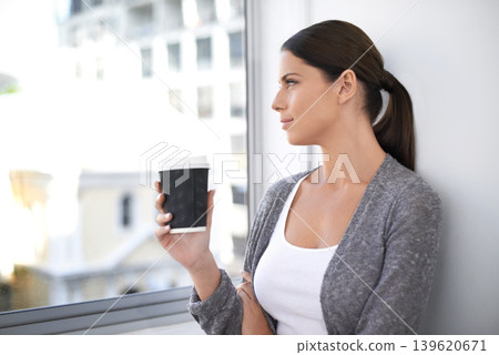 Drinking coffee, thinking and business woman by window to relax, peace or calm in startup office. Dream, idea and creative professional with tea cup, espresso and vision for decision in the morning Drinking coffee, thinking and business woman by window to relax, peace or calm in startup office. Dream, idea and creative professional with tea cup, espresso and vision for decision in the morning 139620671