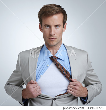 Businessman, portrait and open shirt for superhero in studio, mission and ambition by white background. Male person, professional and confidence for career and pride for job, face and mockup space Businessman, portrait and open shirt for superhero in studio, mission and ambition by white background. Male person, professional and confidence for career and pride for job, face and mockup space 139620776