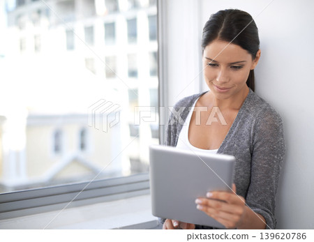 Research, entrepreneur or woman with tablet for networking on social media app, blog or website. Internet, scroll or female person with technology for news, online project and information in office Research, entrepreneur or woman with tablet for networking on social media app, blog or website. Internet, scroll or female person with technology for news, online project and information in office 139620786