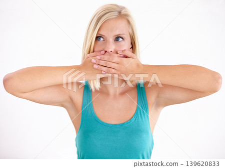 Woman, thinking and cover mouth with secret about announcement in studio on white background. Wow, surprise and girl with hands on face to hush gossip or omg expression for crazy news, story or idea Woman, thinking and cover mouth with secret about announcement in studio on white background. Wow, surprise and girl with hands on face to hush gossip or omg expression for crazy news, story or idea 139620833